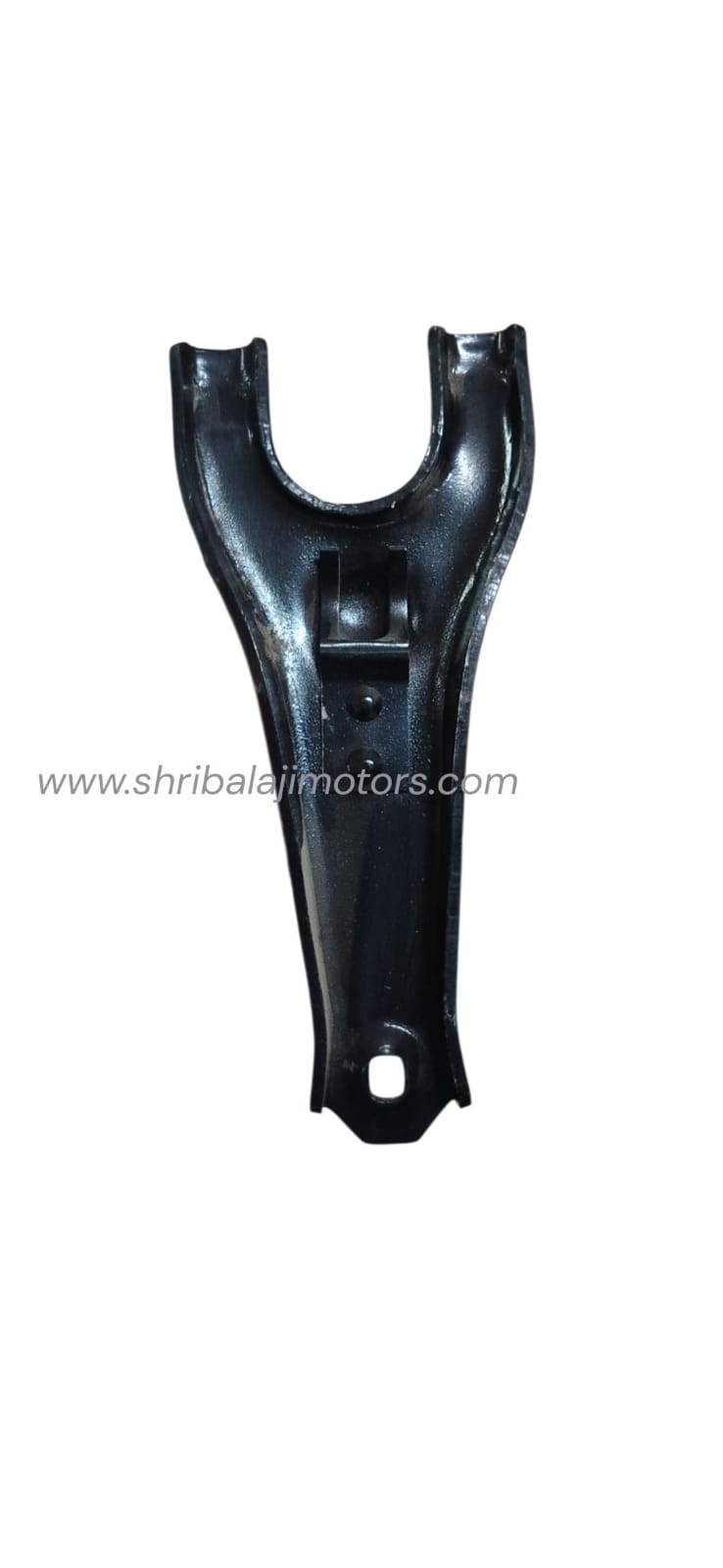 High-Performance Clutch fork tavera for Commercial MUV FleetIn commercial utility vehicles like the Chevrolet Tavera, the transmission layout undergoes continuous operational stress during daily transport and long-haul trips. Over time, constant clutch shifting causes the factory release lever to wear out at the contact points or bend out of shape, leading to hard gear shifting, gear grinding, or an unresponsive clutch pedal. Upgrading to our heavy-duty Clutch fork tavera ensures smooth mechanical leverage and flawless gear transitions.Manufactured using case-hardened forged steel alloy, every Clutch fork tavera is engineered to withstand immense torsional fatigue. This advanced manufacturing process ensures the component can handle high-mileage commercial workloads and heavy fleet operations without experiencing structural failure or slackness.Key Features & Technical Benefits of Tavera Clutch Fork:High-Strength Forged Steel Build: Forged using superior-grade reinforced steel that offers maximum resistance against bending or snapping under intense pedal pressure.Precise Pivot Pocket Layout: Features a clean, accurately machined mechanical socket that matches the factory pivot ball tightly to eliminate loose play or rattling noises.Anti-Corrosive Industrial Coating: Finished with a specialized rust-preventative surface layer that protects the metal component from moisture, road grime, and transmission heat.Exact Tavera Dimensions: Engineered strictly matching the original factory geometry of the Chevrolet Tavera gearbox housing for a hassle-free, bolt-on replacement.Technical Specifications:AttributeSpecificationProduct NameClutch Release Fork / Clutch Fork LeverCompatible VehicleChevrolet Tavera (Neo, Elite, Standard Variants)System ClassificationClutch & Transmission System / Mechanical LinkagesMaterial BaseCase-Hardened Forged Carbon Steel AlloySurface FinishRust-Resistant Protective Electro-CoatingFitment TypeDirect OES Standard ReplacementProfessional Installation & Maintenance Tips for Tavera Clutch OverhaulsInspect the Release Bearing & Pivot Stud: Whenever you install a new Clutch fork tavera, always ensure your mechanic checks the clutch release bearing and the housing pivot stud. Fitting a fresh fork on a worn-out pivot ball can cause uneven pressure, early wear, and annoying pedal squeaks.Apply High-Temperature Grease: During installation, ensure a light coat of high-temperature grease is applied specifically to the fork ends and the internal pivot socket. This significantly reduces mechanical friction and guarantees a much lighter and smoother clutch pedal feel for the driver.